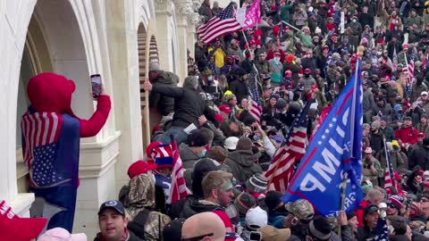 Coordination Between Multiple Individuals to Break Capitol Window