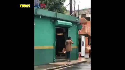 Funny video must watch man throw cold water on him friend from rooftop