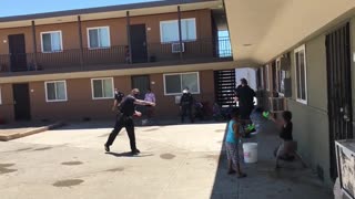 FPD Officers engage in epic water balloon fight with local kids