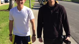 Two Asian Dudes Making Weird Sounds While Walking