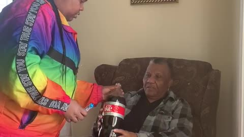 Girl Gets Grandmother with Soda Gag