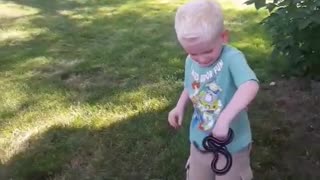 Boy Catches Garden Snake and Gets Bit
