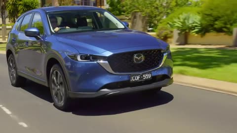 Mazda CX-5 Touring Petrol AWD in Eternal Blue Driving in the country