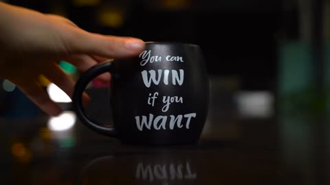 A Mug with Printed Motivational Quote