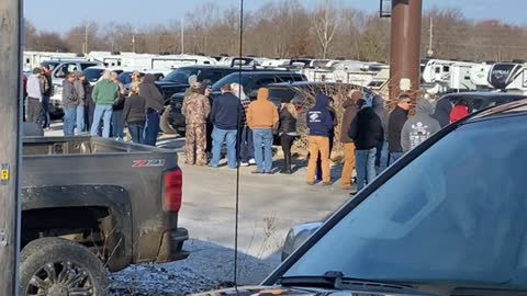 Customers Line up to Load up on Guns and Ammo