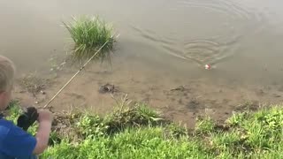 Siblings Use Encouragement to Catch Fish