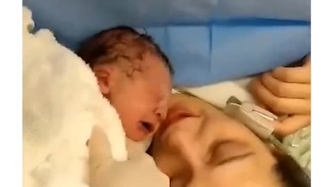 Baby reacts to mother first kiss
