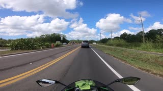 Driver Knocks Helmet Camera off Motorcycle Rider