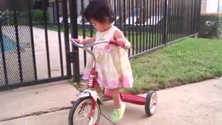 Toddler Girl Too Short To Pedal Her Tricycle