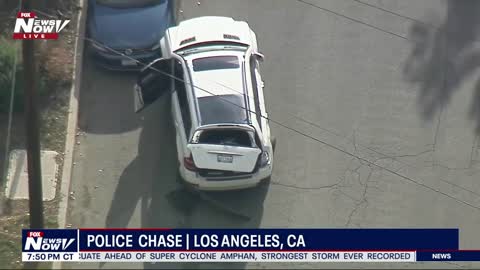 LA Police Chase... Suspect Hits Cop Car then Bails on Foot...