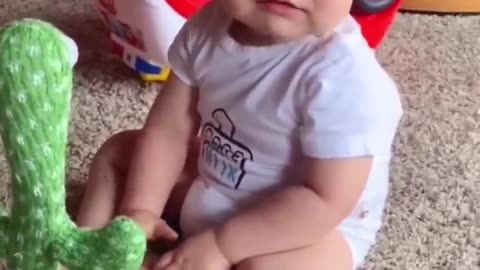 Babies Mesmerized and Amused By Fun Dancing Cactus Toy
