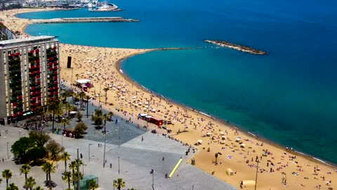 A tourist beach with crowds of people