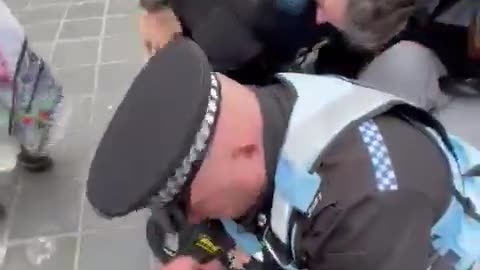 UK police during a peaceful pro-Palestinian protest.