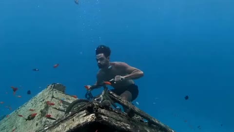 Ride a bicycle underwater