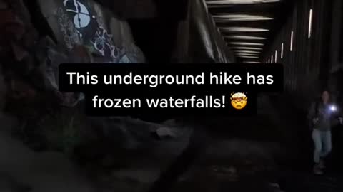 This underground hike has frozen waterfalls!