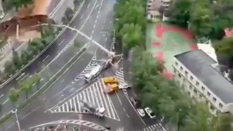 A Big Sinkhole Suddenly Appeared On A Street, China