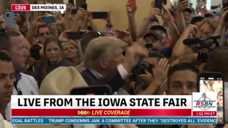 President Donald J Trump makes his way through the crowd at the Iowa State Fair in Des Moines, IA