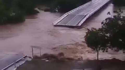 World Book "Bridge collapses due to flash flood"