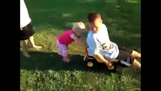 Toddler Tries To Push Older Brother Down A Hill
