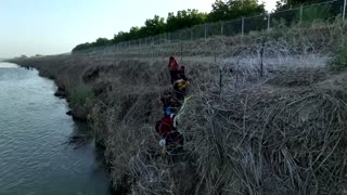 Drone captures migrants crossing the Rio Grande