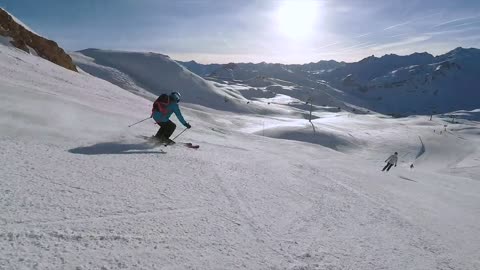 Mountain Skiing On Snow Covered Mountains