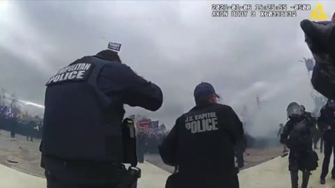 Jan 6 - cop shooting a tear gas grenade *into police lines* causing them to retreat for air