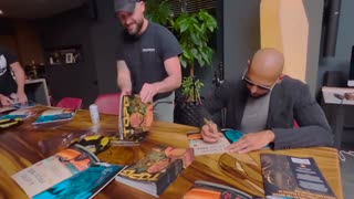 Andrew Tate Signs Copies Of His NEW Comic Book DNG Comics (NEW VIDEO)