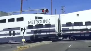 A Moving Train Smashes Into a Car While Going Full Speed