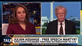 Julian Assange's wife BLASTS John Bolton as “war criminal" to his FACE