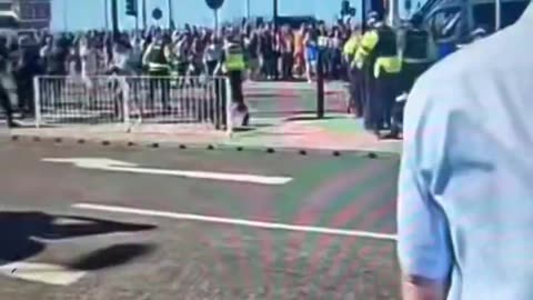 Blackpool erupts. Police dog drags subject.
