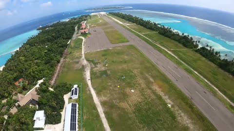 WingSuit Flying Over Maldives Island