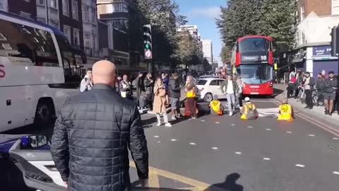 'I have to go to hospital': Motorists drag 'Just Stop Oil' protesters off the road in London