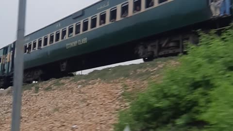 Train on river bridge