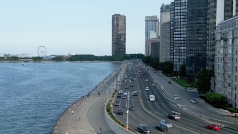 Drone Footage of Traffic on a Coastal City Highway