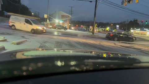 Work van vs curb on icy road