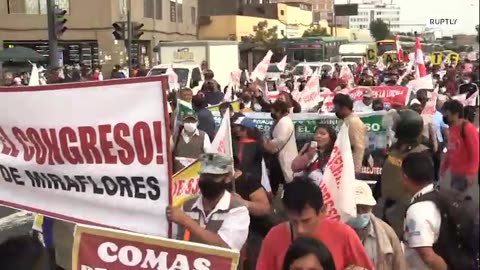 Thousands of protesters march to congress in Lima demanding agrarian reform