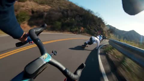 Longboarders vs Cyclist - Who's Faster?