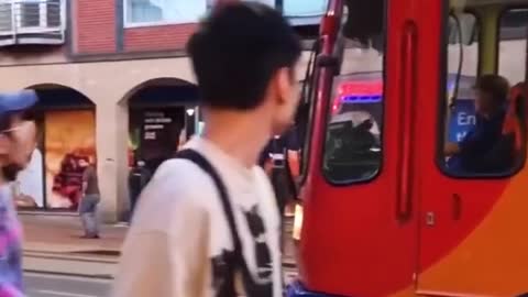 A takeaway driver parks his car stupidly by obstructing a tram, watch the full f_1