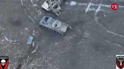 AFTER THEIR MILITARY EQUIPMENT WAS SHOT, RUSSIANS SOUGHT TO HIDE UNDER TANKS TO AVOID THE DRONE