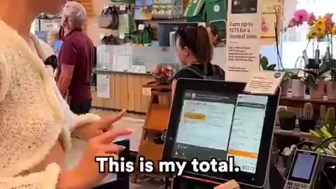 Digital ID in California. Paying for groceries with her palm.