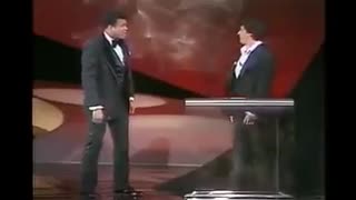 Muhammad Ali surprises Sylvester Stallone at the 1977 Oscars.