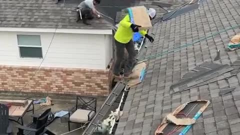Roofer Appears to Float Up Ladder