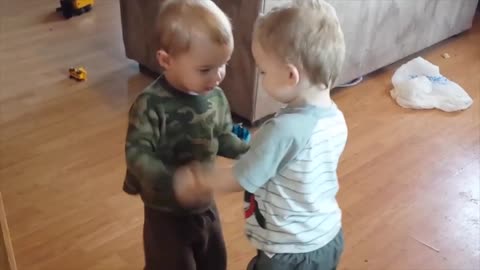 Funny Twins Babies Playing Together