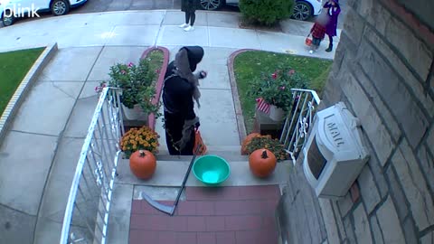 Kid Refills Halloween Candy Bowl From His Own Bag