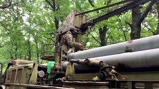 Ukrainian soldiers fire rocket launchers in Kharkiv