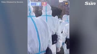 Chinese workers in world largest iPhone factory protest against Covid rules