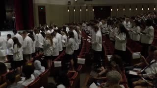 University of Minnesota medical students swear an oath to be inducted in the cult of CRT.
