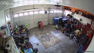 Dad Rescues Baby From Garage Door Ride