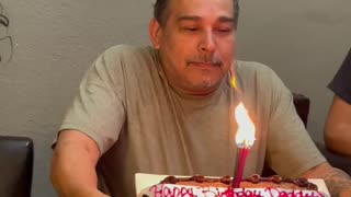 Dad Blowing Out Birthday Candles Loses Teeth