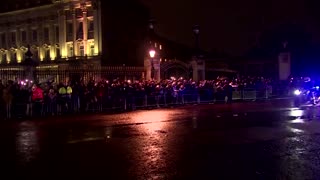 Crowds watch Queen's coffin journey to Buckingham Palace